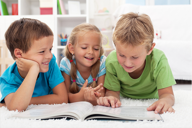 Three kids learning to read