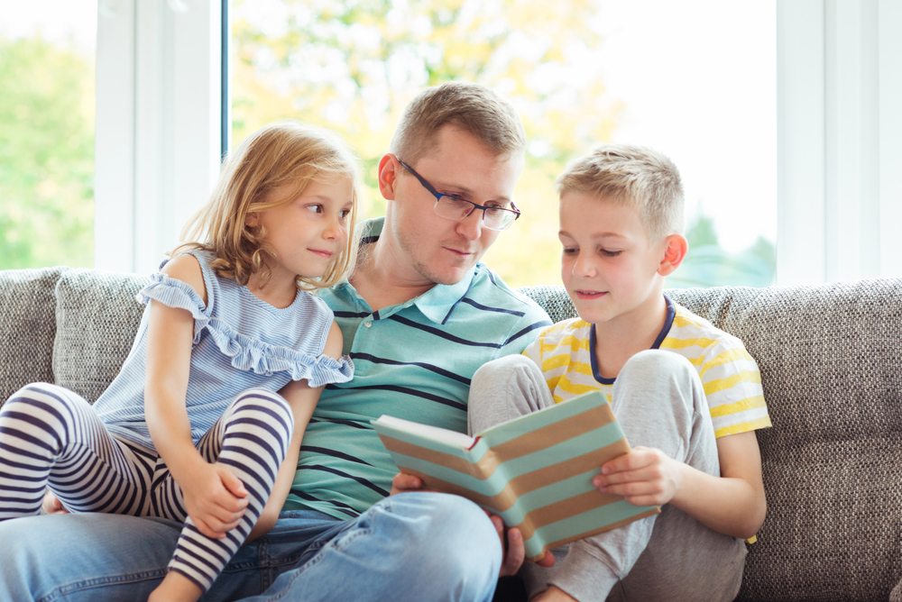 Family reading aloud together