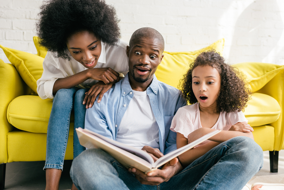 Family enjoying reading aloud together