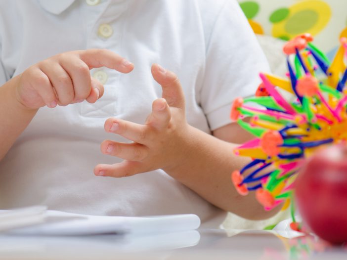 Child counting on fingers