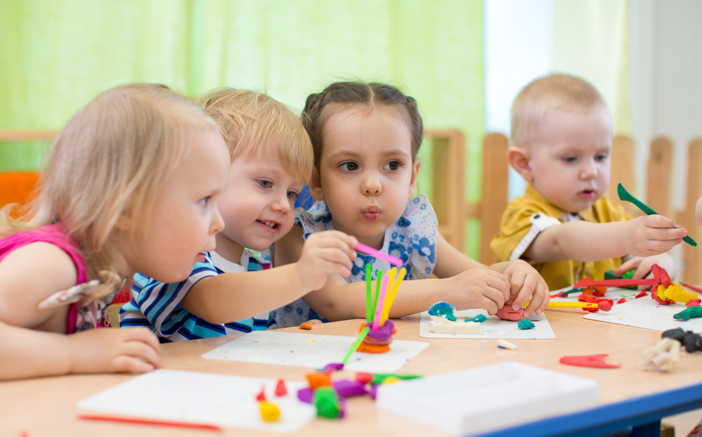 Kids group learning of shapes through art