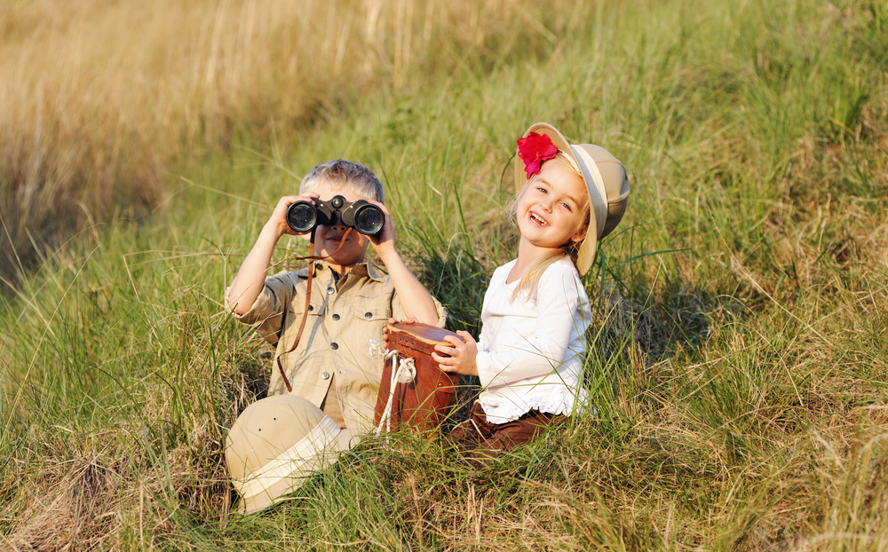 Kids dressed up in safari gear during dramatic play