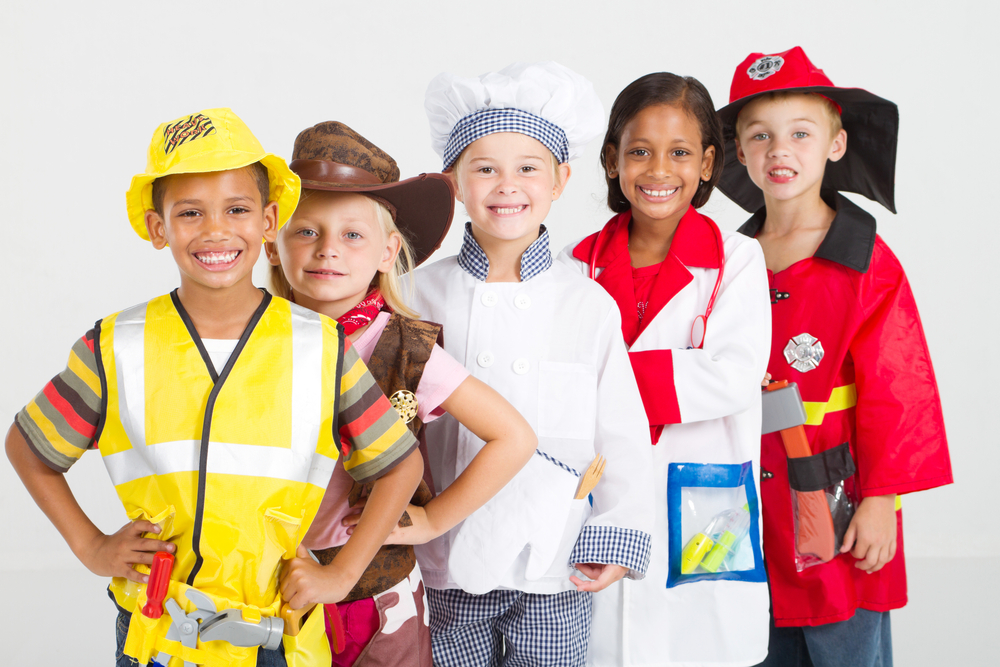 group of kids in uniforms costumes