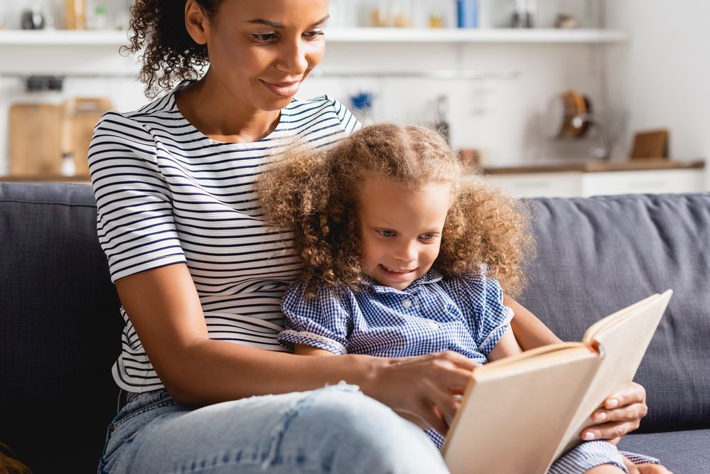 Parent working with child on vocabulary strategies