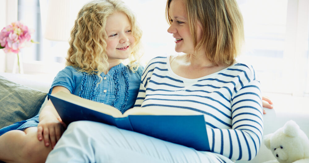 Mom reading to help her child learn adjectives