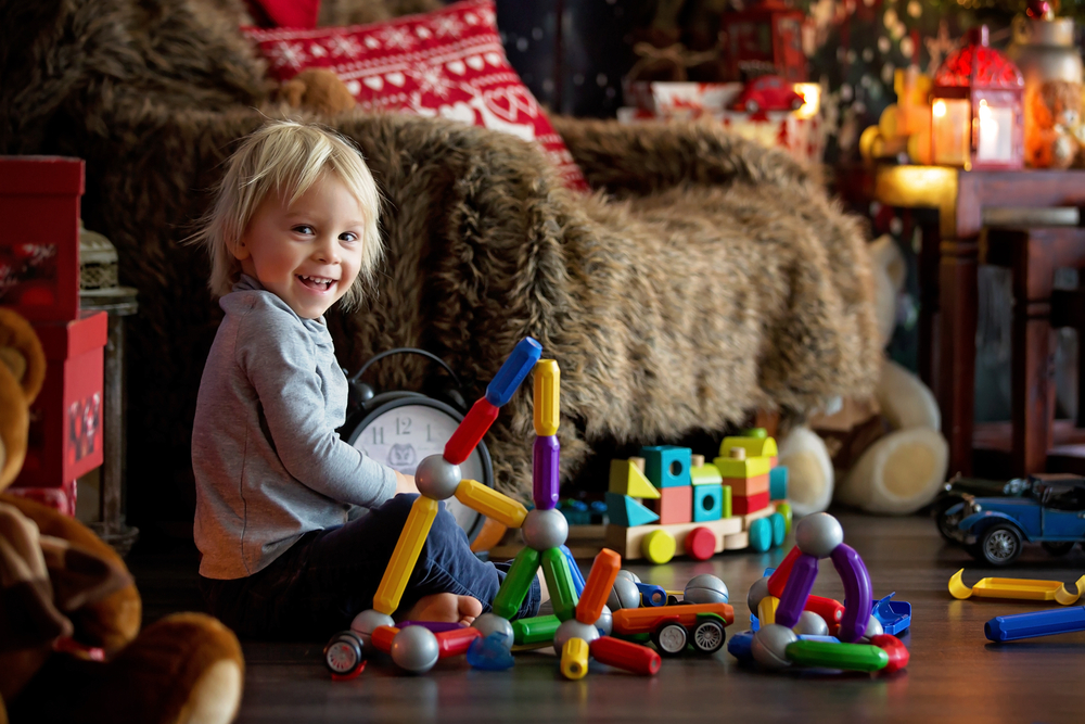 Young kid playing with blocks