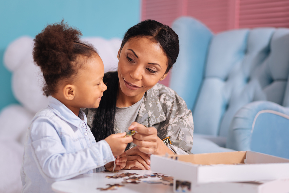 Mom giving a gift to child