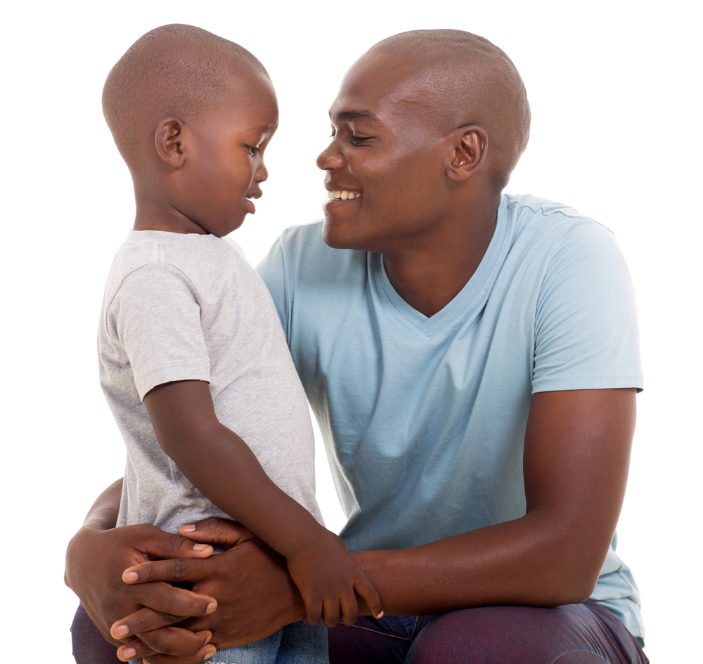 Man talking to his son about emotions for kids