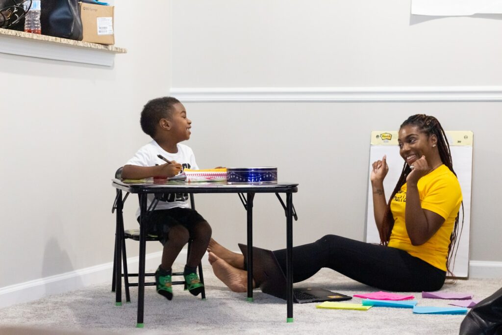 Mom helping kid with homework