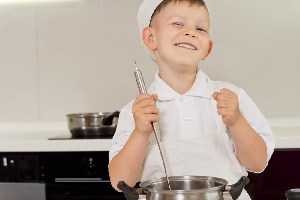 Young boy cooking 