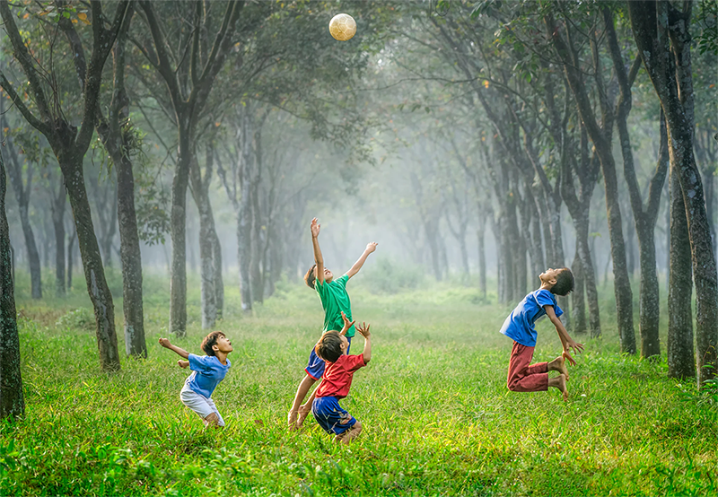 Kids playing soccer to build confidence