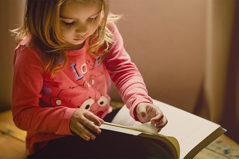 Girl reading a book