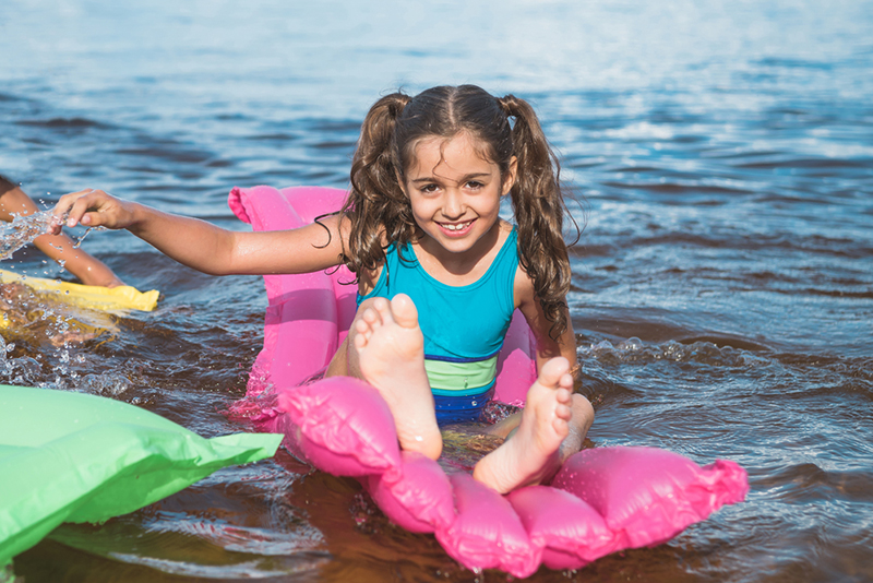 Young girl experiencing summer slide 