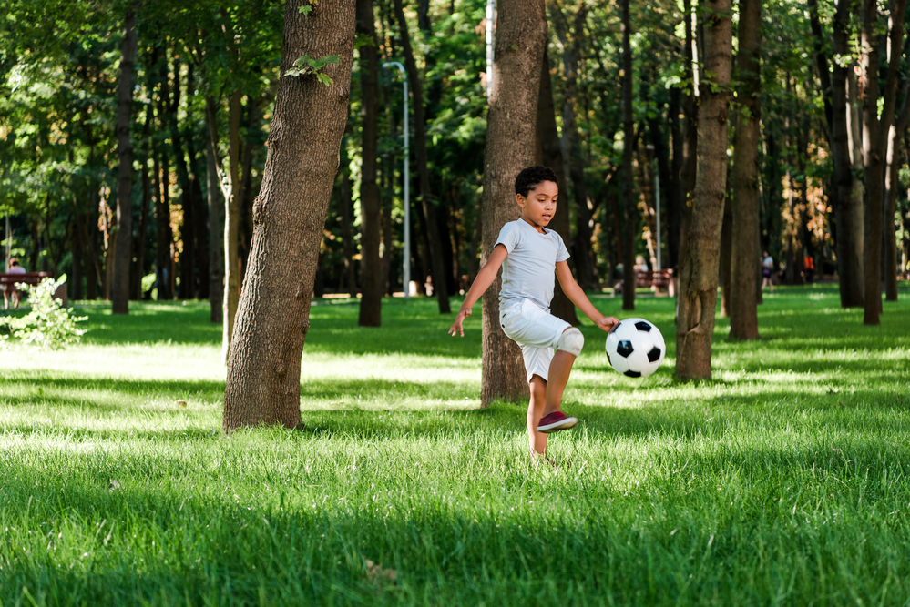 Young kid enjoying free time during summer 