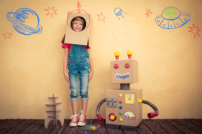 Kids playing robot wit boxes