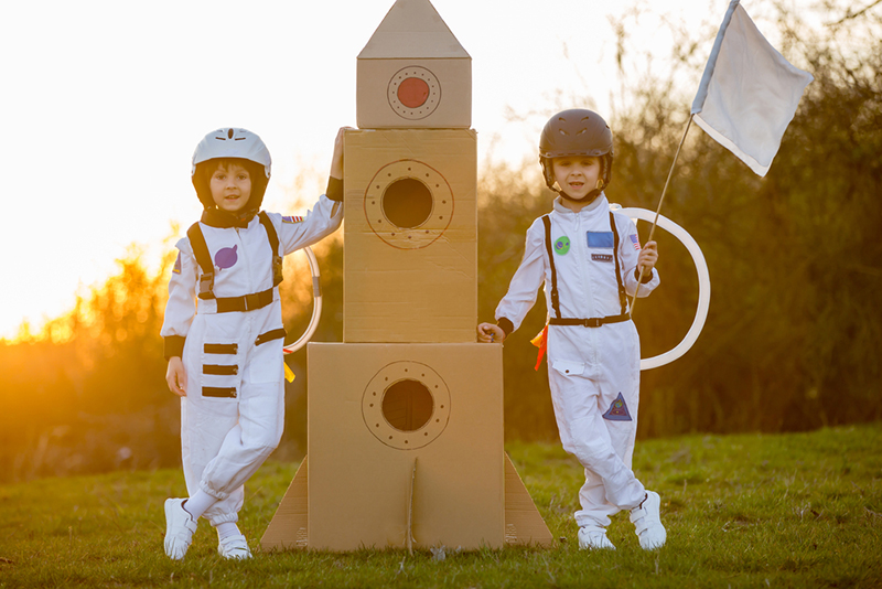 Two kids having make-believe play date