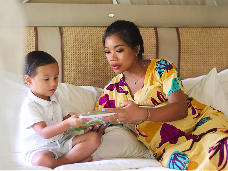 Mom reading with son