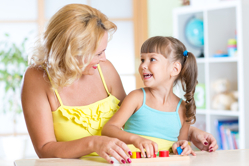 Mom teaching pre-K math