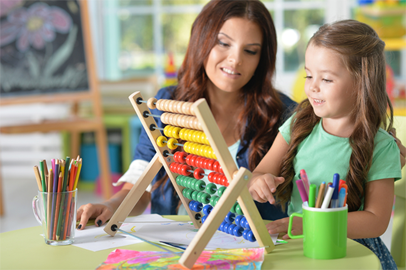 Mom encouraging a love of pre-K math at home