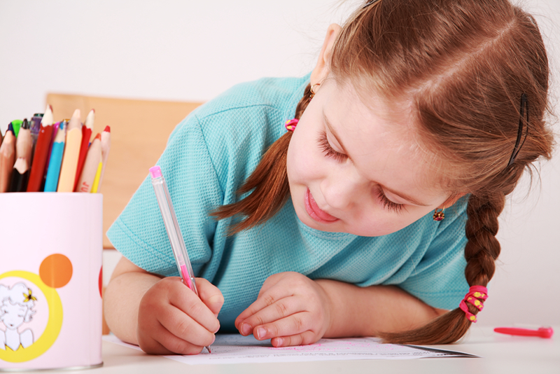 young girl doing pre-k math