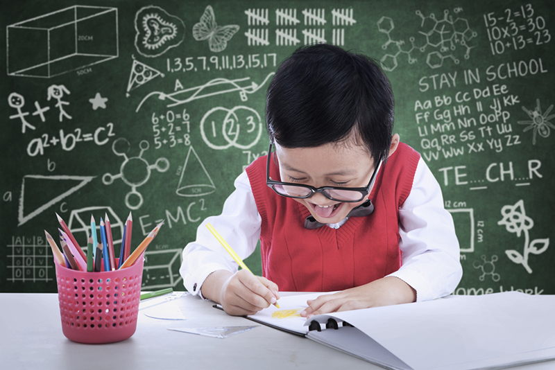 Kid having fun learning preschool math
